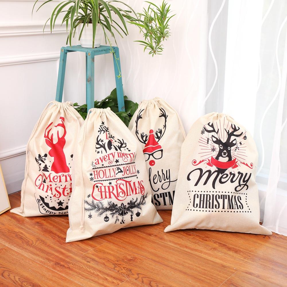 Heiße verkaufende große Kordelzugbeutel Weihnachten wiederverwendbare Baumwolltasche Rentier Santa Säcke Weihnachtsgeschenktüten